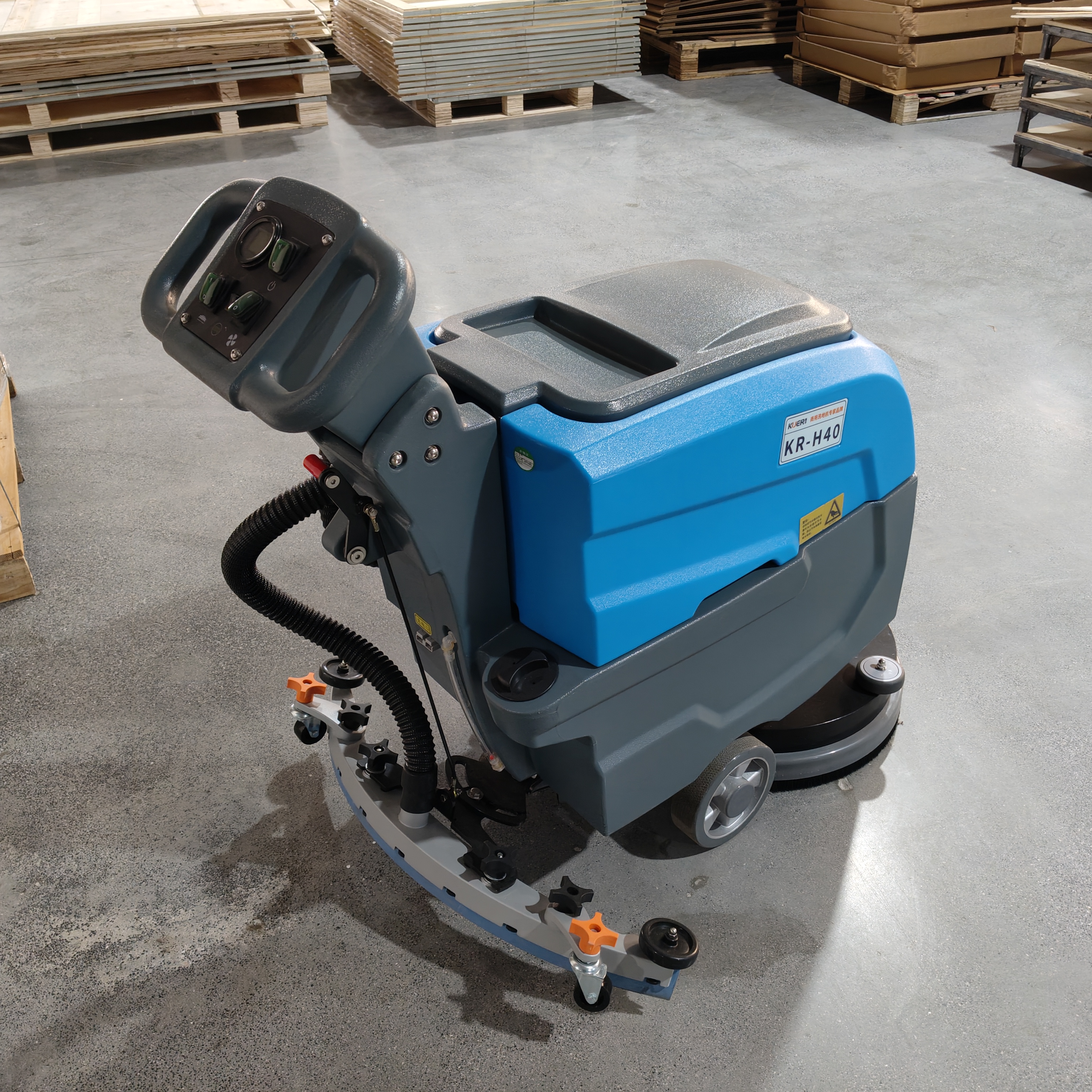 walk behind floor scrubber used for warehouse floor cleaning